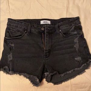 Distressed black jean shorts